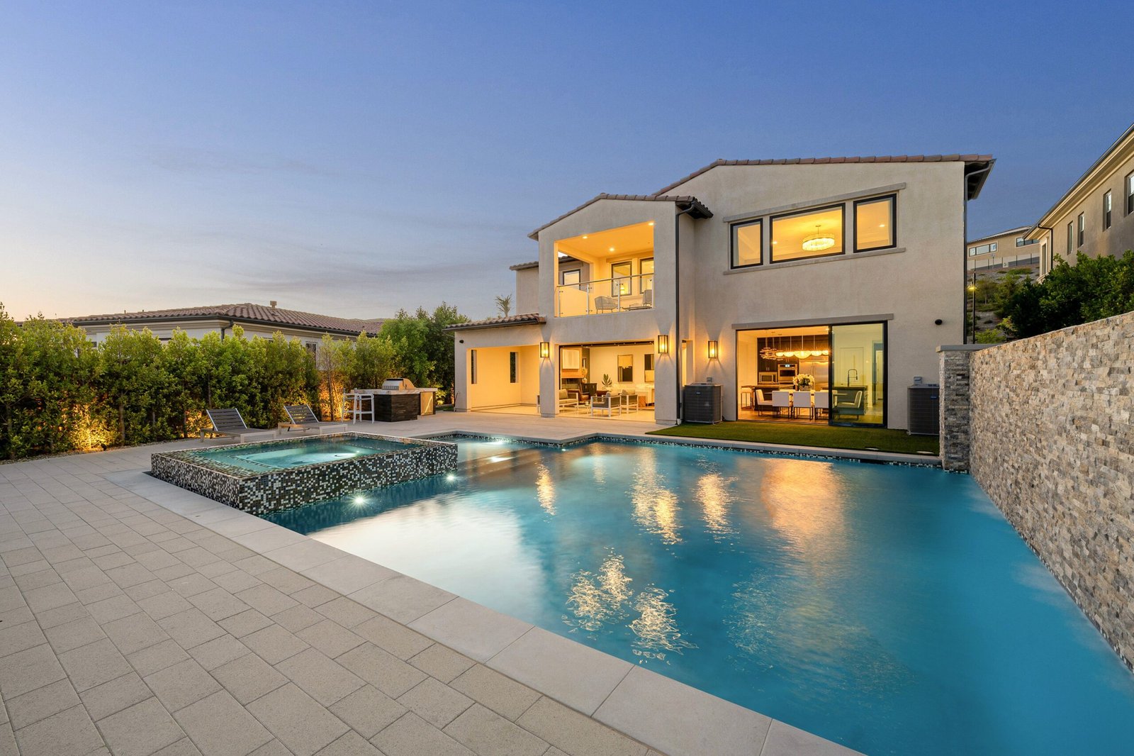 Luxury house with pool at twilight